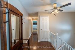 Hallway leading to 2 bedrooms on main level - 