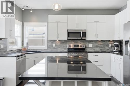 311 Mahabir Court, Saskatoon, SK - Indoor Photo Showing Kitchen With Upgraded Kitchen