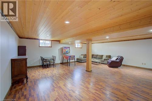 Fully finished basement with wood stove and ample room for home theatre, play room, gym and more - 802080 Grey Road 40, Chatsworth (Twp), ON - Indoor Photo Showing Basement