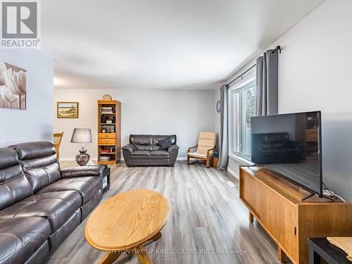 11 Bellefield Crescent, Wellington North, ON - Indoor Photo Showing Living Room With Fireplace