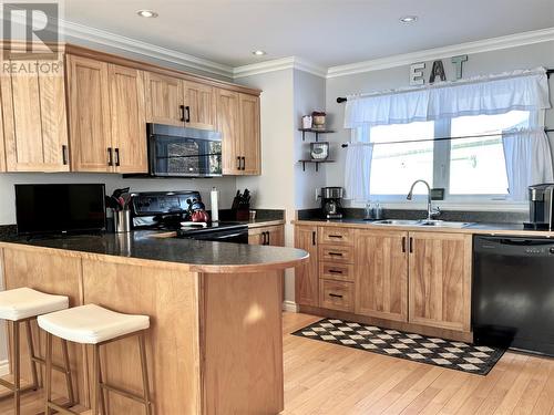 9 Brook Close, Humber Valley Resort, NL - Indoor Photo Showing Kitchen With Double Sink