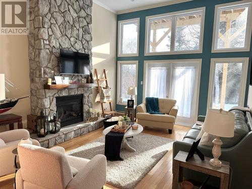 9 Brook Close, Humber Valley Resort, NL - Indoor Photo Showing Living Room With Fireplace