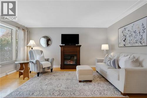14 Hearth Crescent, Kitchener, ON - Indoor Photo Showing Living Room With Fireplace
