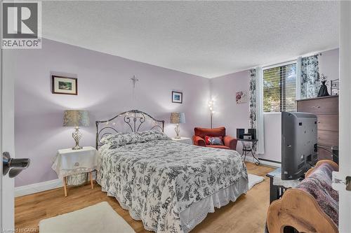 Primary Bedroom - 93 Westwood Road Unit# 206, Guelph, ON - Indoor Photo Showing Bedroom