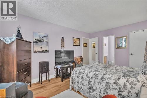 Primary Bedroom - 93 Westwood Road Unit# 206, Guelph, ON - Indoor Photo Showing Bedroom