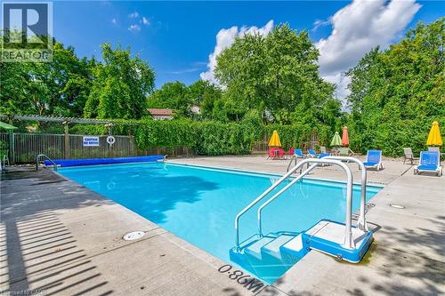 Pool - 93 Westwood Road Unit# 206, Guelph, ON - Outdoor With In Ground Pool With Backyard