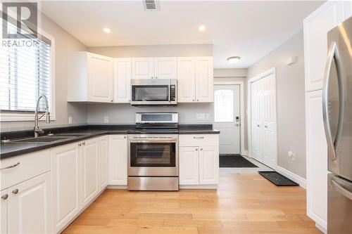 312 Allan Street, Coniston, ON - Indoor Photo Showing Kitchen With Double Sink