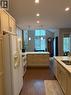 13 Oakwood Links Lane, Grand Bend, ON  - Indoor Photo Showing Kitchen With Double Sink 
