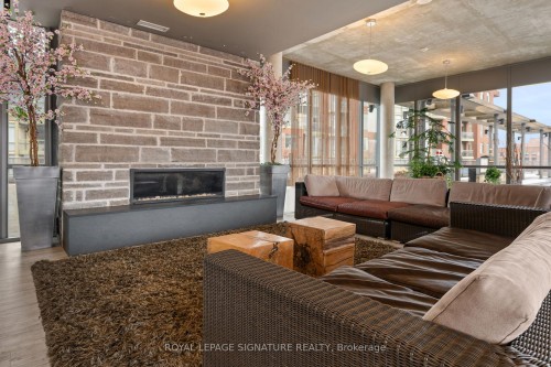 606-33 Mill Street, Toronto, ON - Indoor With Fireplace