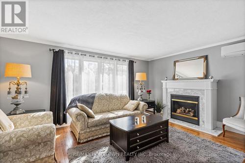 4 Meikle Drive, Augusta, ON - Indoor Photo Showing Living Room With Fireplace