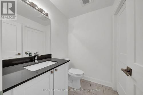 2pc Powder Room - 216 - 50 Lakebreeze Drive, Clarington (Newcastle), ON - Indoor Photo Showing Bathroom