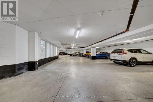 Underground Parking - 216 - 50 Lakebreeze Drive, Clarington (Newcastle), ON - Indoor Photo Showing Garage