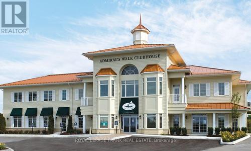 Admiral's Walk Clubhouse - 216 - 50 Lakebreeze Drive, Clarington (Newcastle), ON - Outdoor With Facade