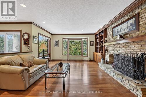 Main Floor: Family Room - 126 Somerset Road, London South (South K), ON - Indoor Photo Showing Living Room With Fireplace