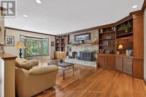 Main Floor: Family Room - 126 Somerset Road, London South (South K), ON - Indoor Photo Showing Living Room With Fireplace