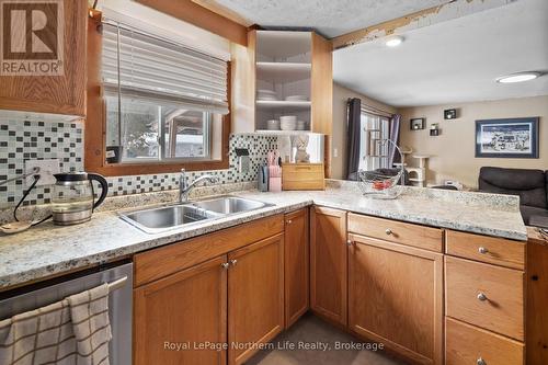 294 Mountain Road, Callander, ON - Indoor Photo Showing Kitchen With Double Sink
