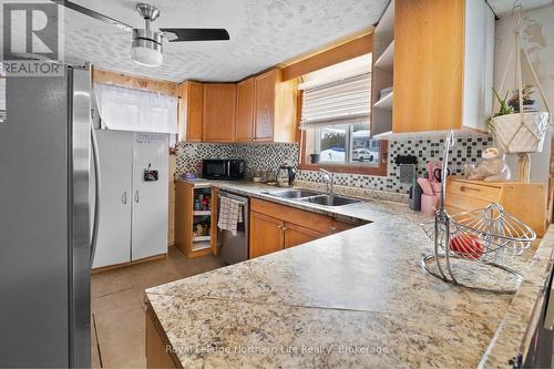 294 Mountain Road, Callander, ON - Indoor Photo Showing Kitchen With Double Sink