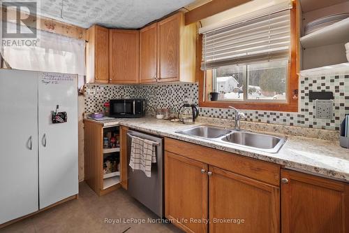 294 Mountain Road, Callander, ON - Indoor Photo Showing Kitchen With Double Sink