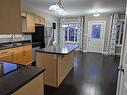 1 35 Lilac Place, Niverville, MB  - Indoor Photo Showing Kitchen With Double Sink 