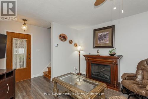 91 Oak Street, Unorganized Townships (Thorne), ON - Indoor Photo Showing Living Room With Fireplace