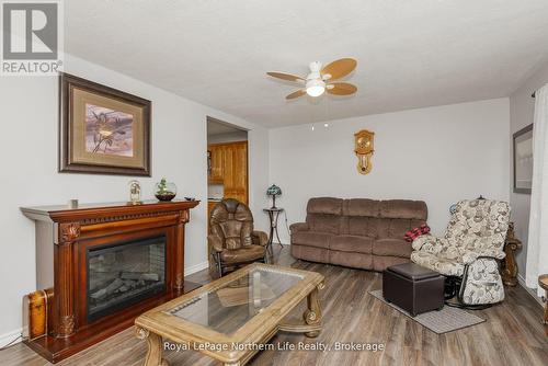 91 Oak Street, Unorganized Townships (Thorne), ON - Indoor Photo Showing Living Room With Fireplace