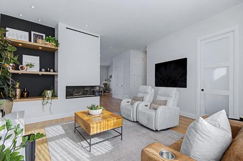 Salon - 4009 Rue Des Bolets, Saint-Bruno-De-Montarville, QC - Indoor Photo Showing Living Room With Fireplace