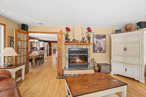 Salon - 38 Imp. Denise, Lac-Supérieur, QC - Indoor Photo Showing Living Room With Fireplace