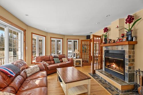 Salon - 38 Imp. Denise, Lac-Supérieur, QC - Indoor Photo Showing Living Room With Fireplace