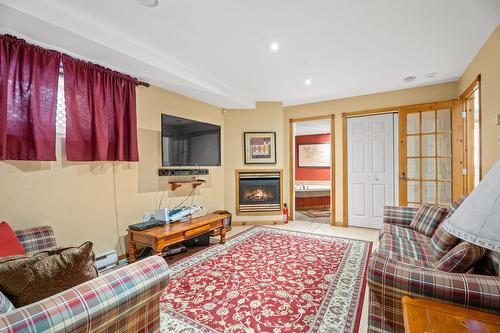 Salle familiale - 38 Imp. Denise, Lac-Supérieur, QC - Indoor Photo Showing Living Room With Fireplace