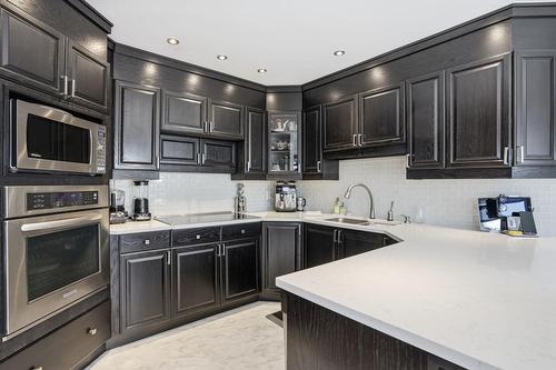 Cuisine - 320 Rue Brion, Saint-Amable, QC - Indoor Photo Showing Kitchen With Upgraded Kitchen