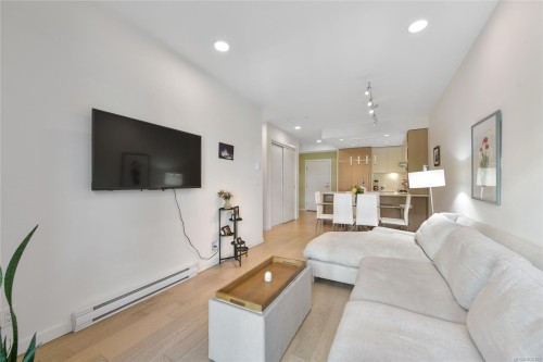 211-1033 Cook St, Victoria, BC - Indoor Photo Showing Living Room