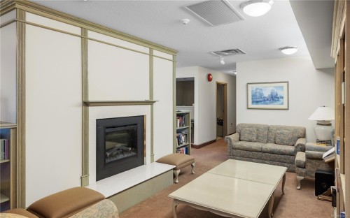 105-3915 St. Georges Lane, Saanich, BC - Indoor Photo Showing Living Room With Fireplace