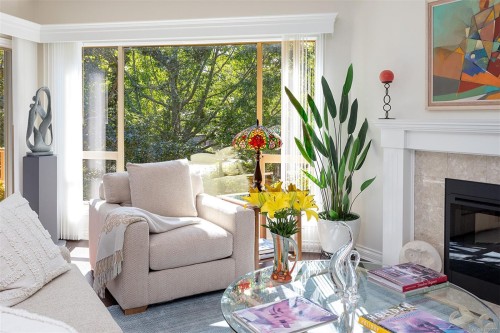 4-910 Maltwood Terr, Saanich, BC - Indoor Photo Showing Other Room With Fireplace