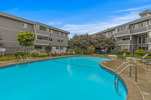 112-445 All Star Court, Kelowna, BC - Outdoor With In Ground Pool With Backyard