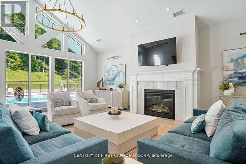 403 - 100 The Promenade, Central Elgin, ON - Indoor Photo Showing Living Room With Fireplace