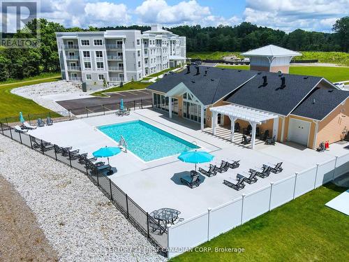 403 - 100 The Promenade, Central Elgin, ON - Outdoor With In Ground Pool