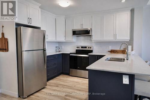 403 - 100 The Promenade, Central Elgin, ON - Indoor Photo Showing Kitchen With Double Sink With Upgraded Kitchen