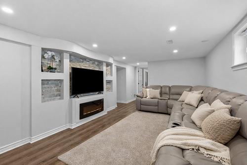 Salle familiale - 848 Rue Gilles, Laval (Fabreville), QC - Indoor Photo Showing Living Room With Fireplace