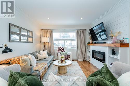 145 - 1050 Shawnmarr Road, Mississauga, ON - Indoor Photo Showing Living Room With Fireplace