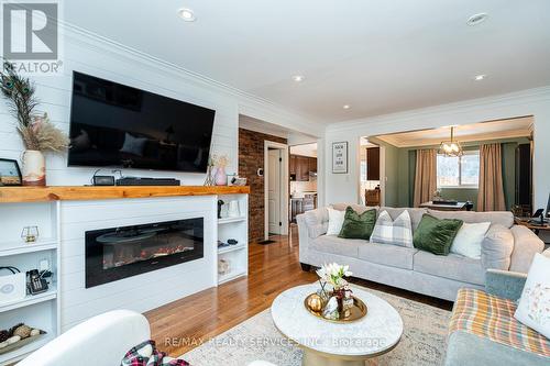 145 - 1050 Shawnmarr Road, Mississauga, ON - Indoor Photo Showing Living Room With Fireplace