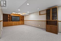 Large recroom with wall to wall built in. - 