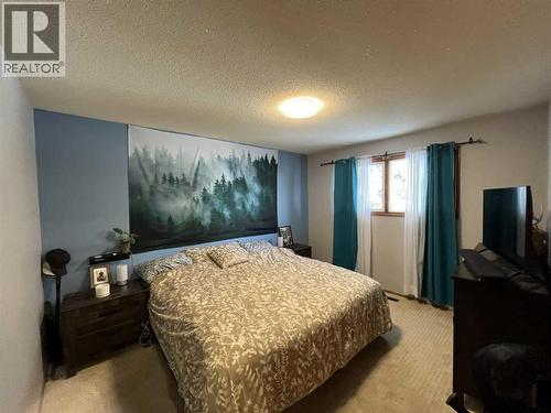 4617 51 Avenue, Taber, AB - Indoor Photo Showing Bedroom