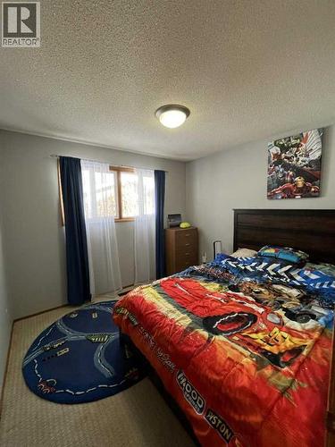4617 51 Avenue, Taber, AB - Indoor Photo Showing Bedroom