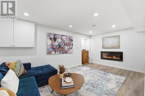 Fully finished lower level - 196 Orchard Heights Boulevard, Aurora, ON - Indoor Photo Showing Living Room With Fireplace