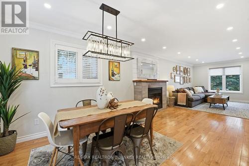 A seamless living & dining space - 196 Orchard Heights Boulevard, Aurora, ON - Indoor Photo Showing Dining Room With Fireplace