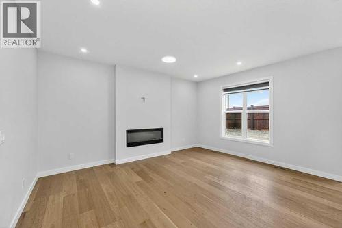 268 Cornerbrook Road Ne, Calgary, AB - Indoor With Fireplace