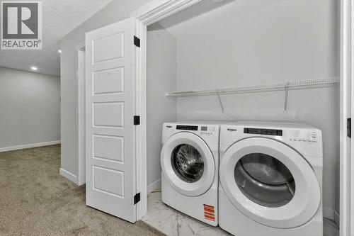 268 Cornerbrook Road Ne, Calgary, AB - Indoor Photo Showing Laundry Room