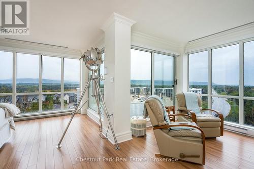 Primary bedroom with expansive views - 1001 - 24 Ramblings Way, Collingwood, ON - Indoor Photo Showing Living Room