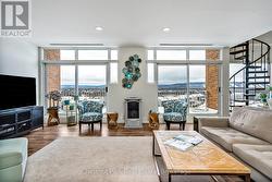 Cozy gas fireplace and views of the ski hills - 