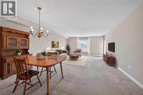 virtually staged living room - 908 Mohawk Road E Unit# 308, Hamilton, ON - Indoor